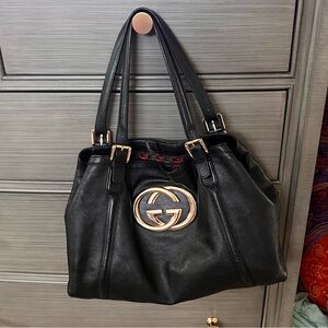 Gucci Brit black leather handbag EUC big interlocking gold GG